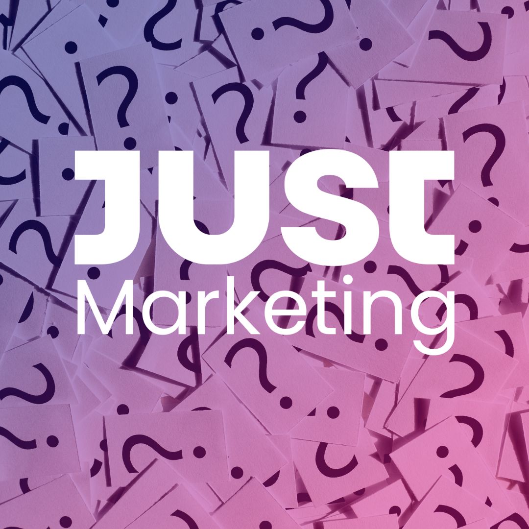 The Just Marketing logo is on top of a collection of small pieces of paper, each with a question mark on it.
