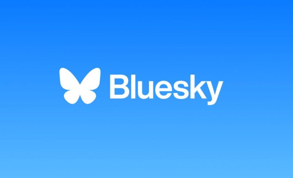 The Bluesky logo on a bright blue gradient background. Features a butterfly and the text "Bluesky"