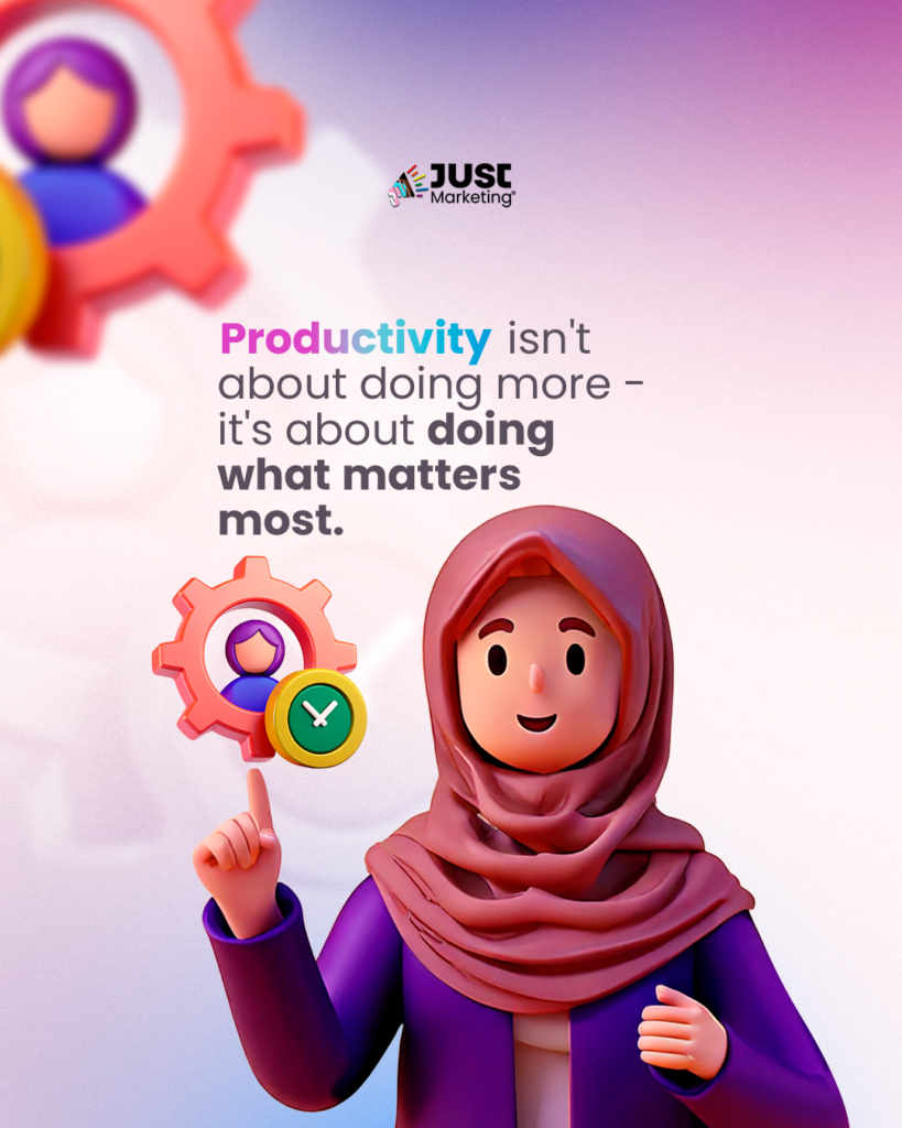 Illustration of a smiling character in a mauve hijab and purple jacket pointing upward. Beside them is a gear icon with a person symbol and a green checkmark. Text reads: ‘Productivity isn't about doing more – it's about doing what matters most.’ The Just Marketing logo appears at the top. Background features soft pink and purple gradients.