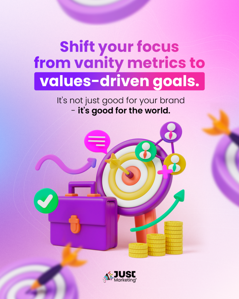 A pink and purple gradient background featuring a dartboard with arrows, a purple briefcase, stacks of coins, and growth icons. Text reads: ‘Shift your focus from vanity metrics to values-driven goals. It's not just good for your brand - it's good for the world.’ The Just Marketing logo appears at the bottom.